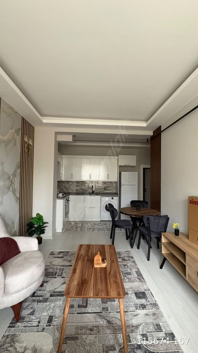 SATILIK 1+1|1 MİLYON KREDİ KÖRFEZDE TRAMVAYA YAKIN SIFIR EŞYALI
