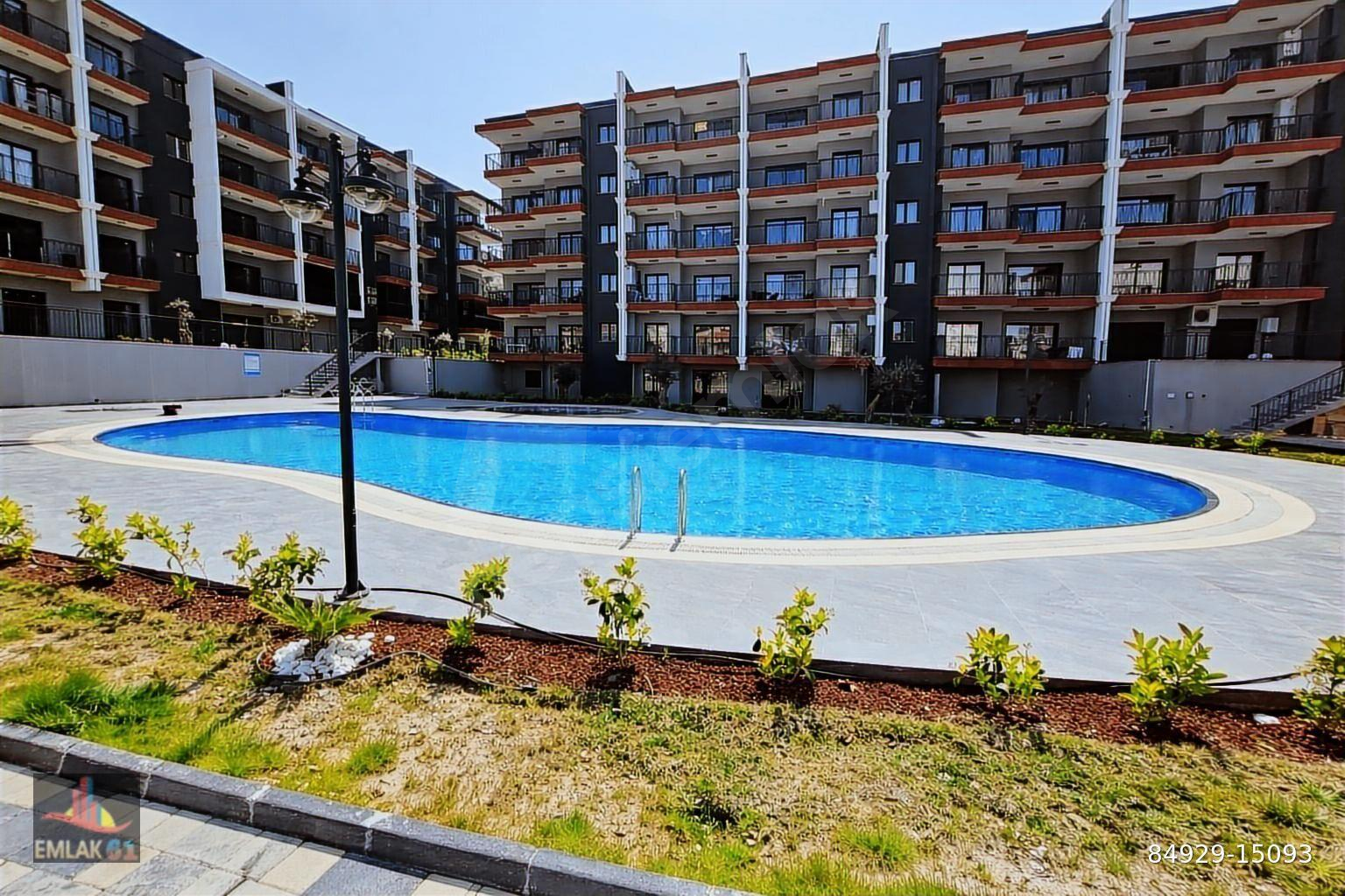 61'den Yetkili Kuşadası Ege Mahallesinde Satılık 2+1 Daire