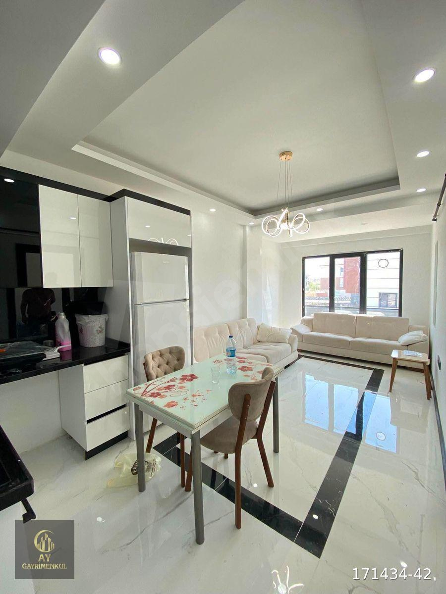 HAVUZLARDA SATILIK 1+1 AMERİKAN MUTFAKLI LÜX SATILIK DAİRE