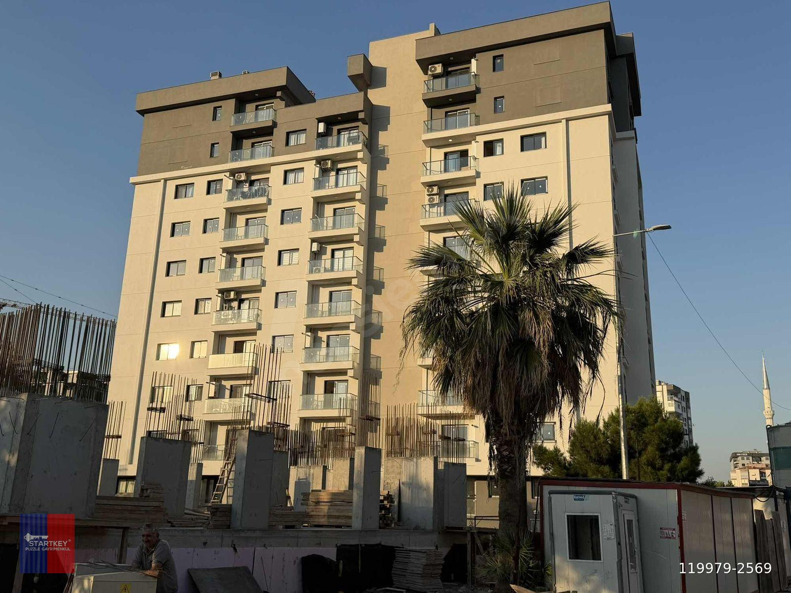 Bayraklı adalet mahallesinde , yeni binada satılık 3+1 daire