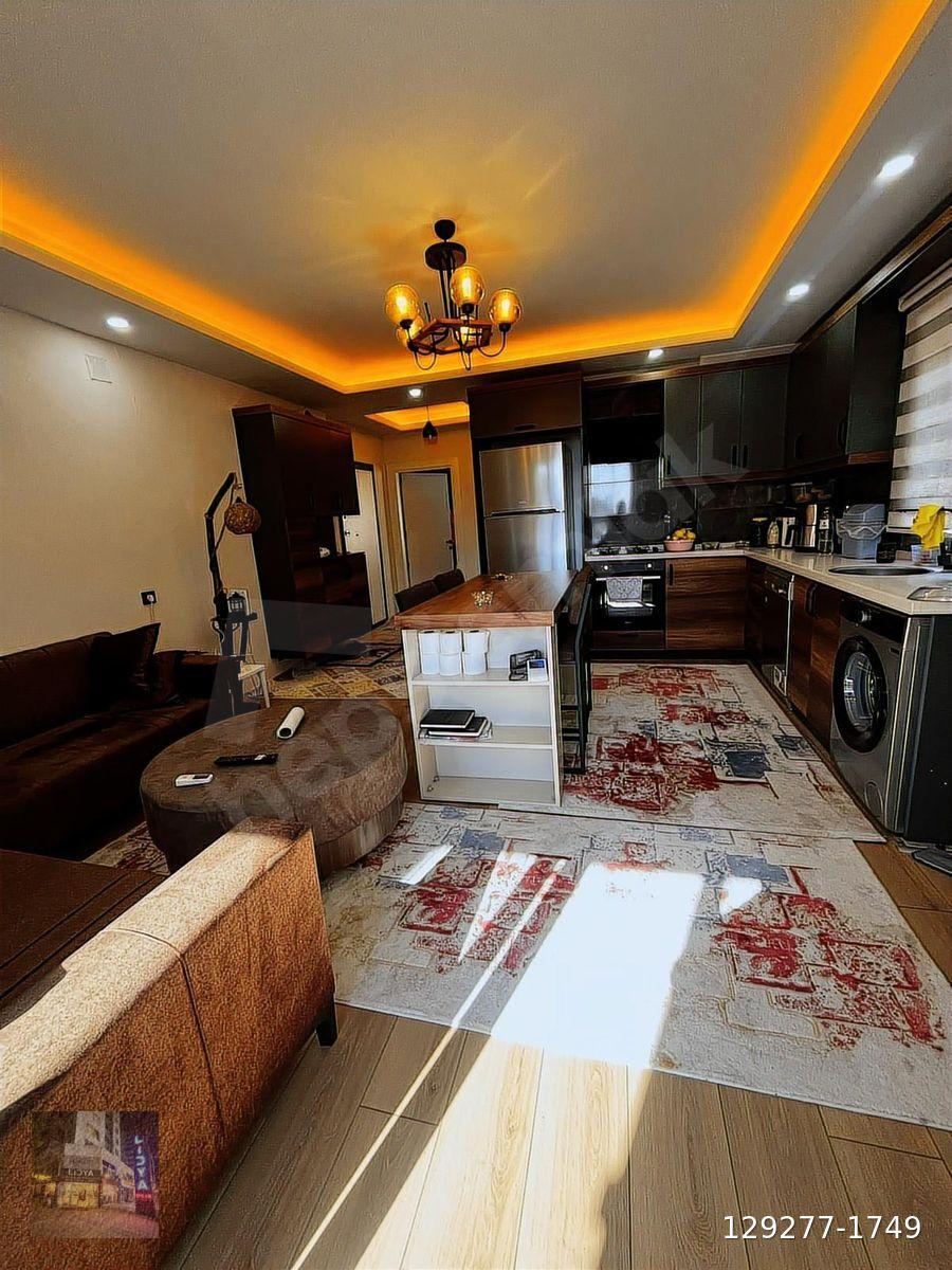 ERDEMLİ AŞAĞI ALATA'DA SATILIK 1+1 HAVUZLU OTOPARKLI DAİRE