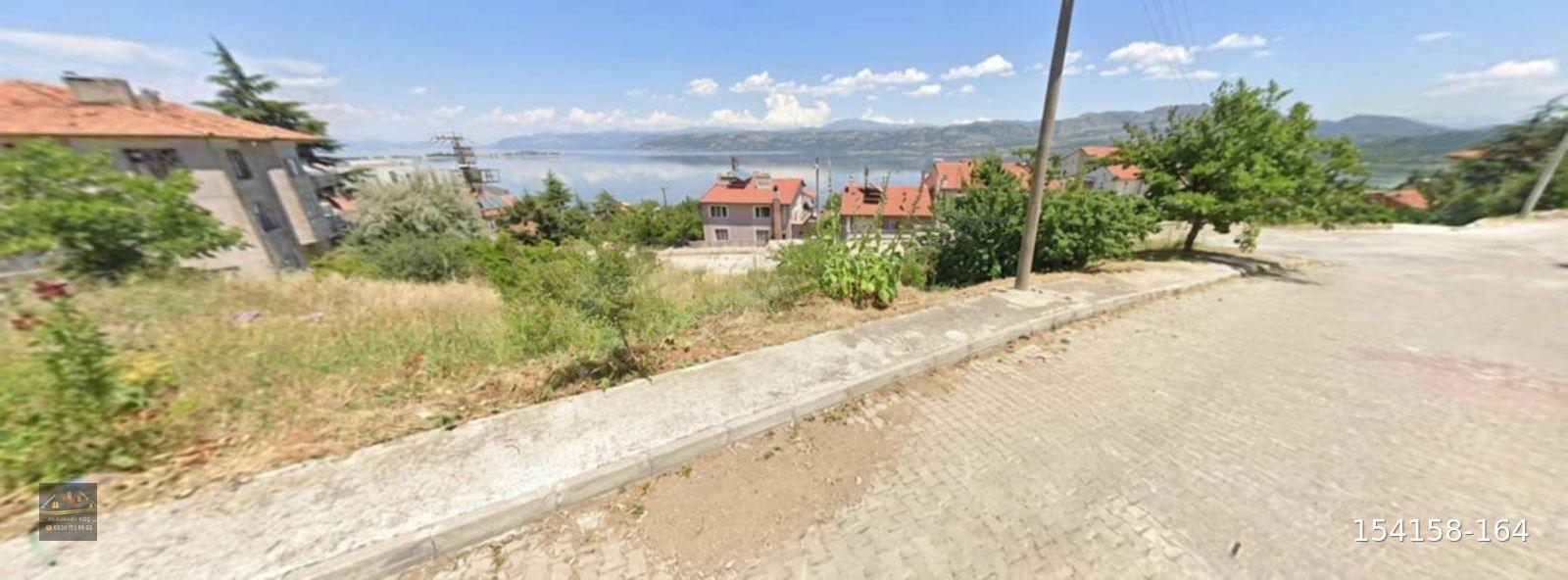 ABDULKADİR KOÇ EMLAK'TAN SATILIK EĞİRDİR GÖLÜ MANZARALI EV VE ARSASI