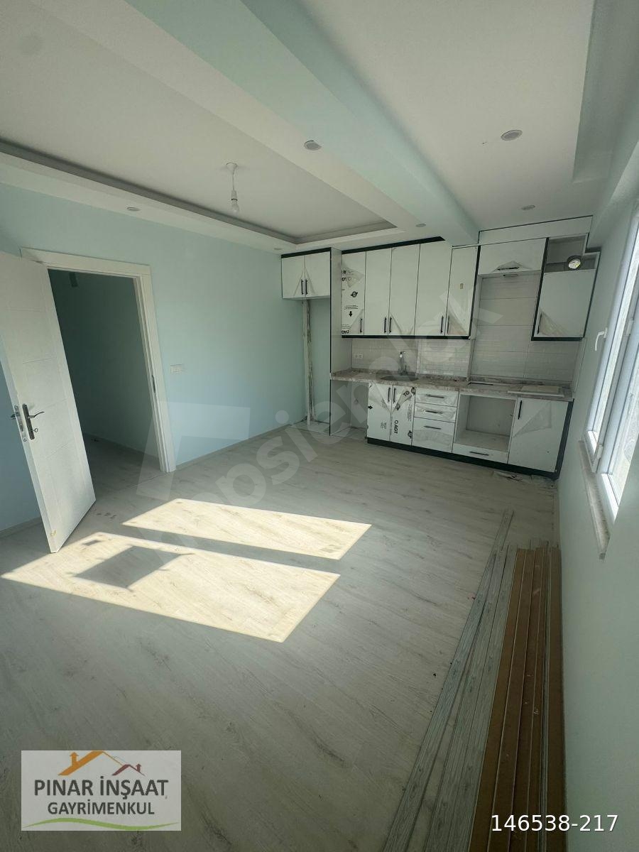 HÜRRİYET MAHALLESİNDE 2+1 BAHÇE NİZAM SATILIK DAİRE