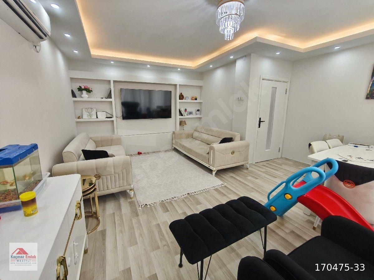 MEZİTLİ DAVULTEPE MAH'DE 2+1 DENİZE SIFIR KONUMDA GENİŞ SATILIK DAİRE