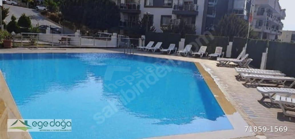 KUŞADASI,nda HAVUZLU SİTEDE DOĞALGAZLI SATILIK 1+1 DAİRE