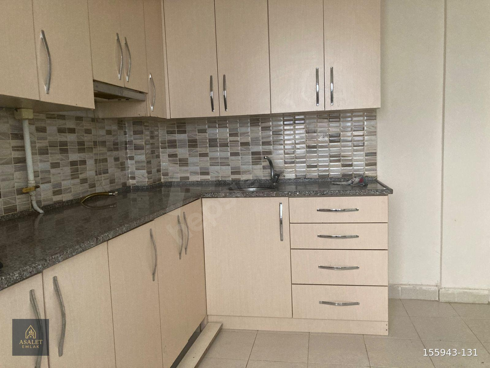 Gülbahar Hatun Mahallesi’nde giriş kat içi yenilenmiş 2 + 1 kiralık daire