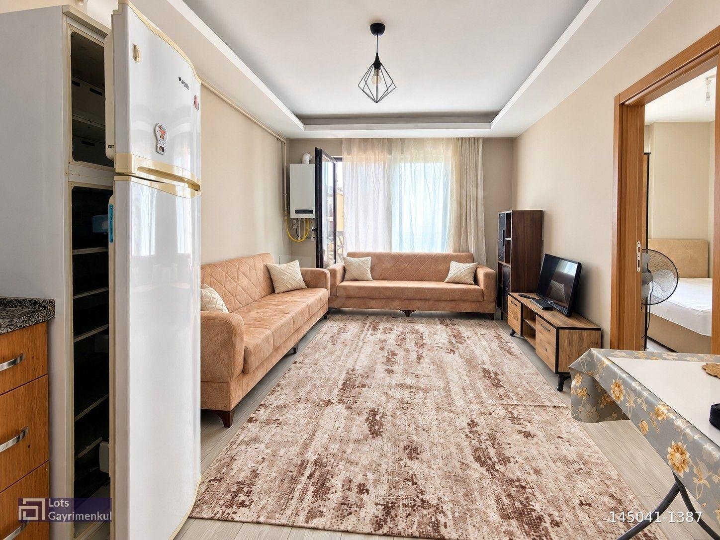 GÖRÜKLEDE YERLEŞİME YAKIN KİRALIK FULL EŞYALI 1+1 ARAKAT DAİRE