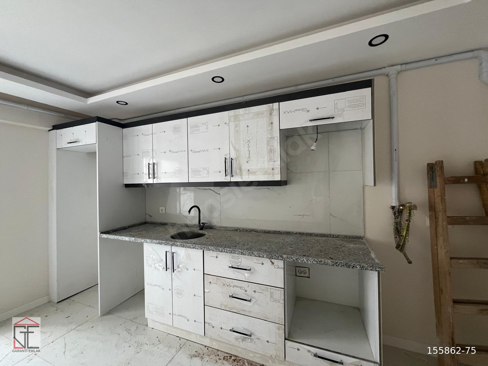 GARANTİ EMLAKTAN SATILIK 2+1 AÇIK MUTFAK