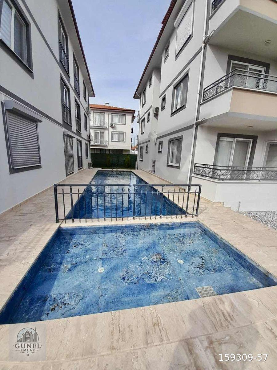 DALAMAN ALTINTAS'TA SİTE İÇERİSİNDE NET 85 m2 SATILIK 2+1 DAİRE