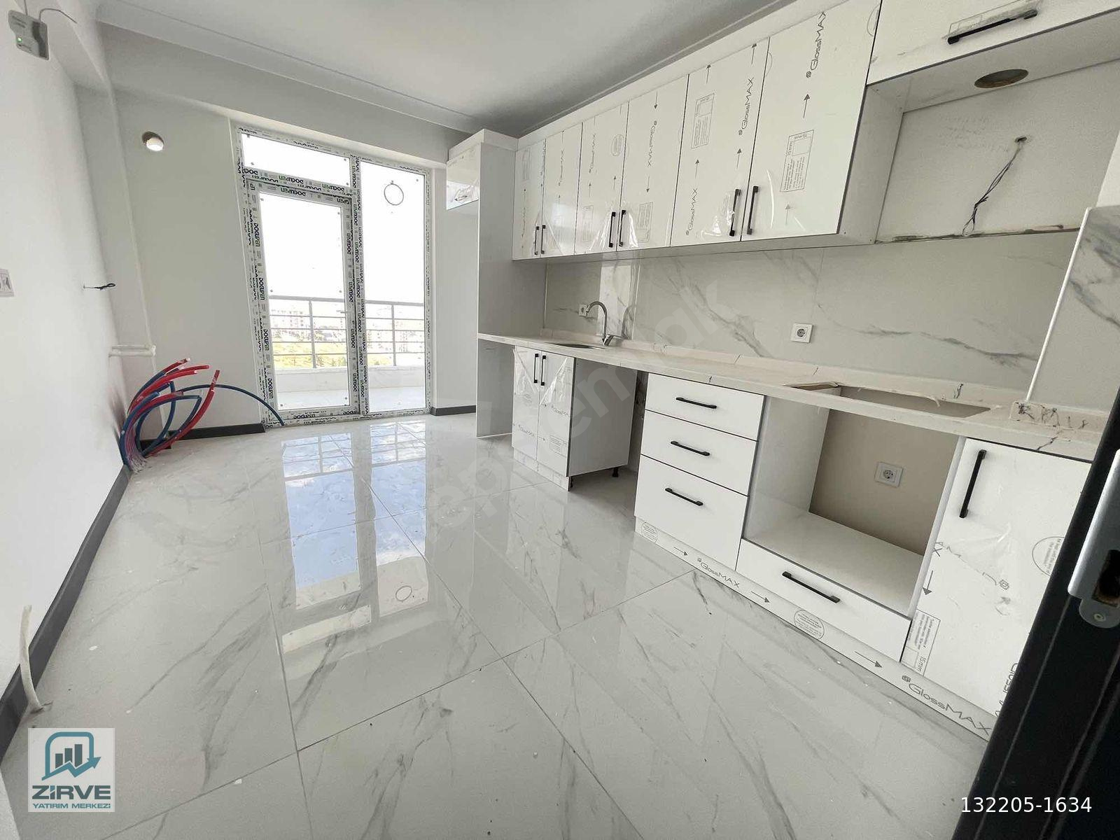 ZİRVE EMLAK'TAN KÖK TAPU ÇİFT BANYO ÖN CEPHE SIFIR SATILIK DAİRE