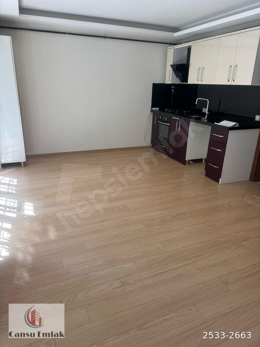 BAHÇELİDE 1+1 YÜKSEK GİRİŞ KOMBİLİ GARAJLI 35 BİN TL CANSUDAN