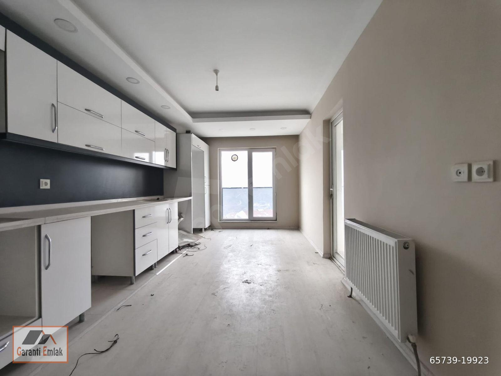 GARANTİ EMLAK'TAN SATILIK 3+1 EBEVEYN BANYOLU ARA KAT DAİRE