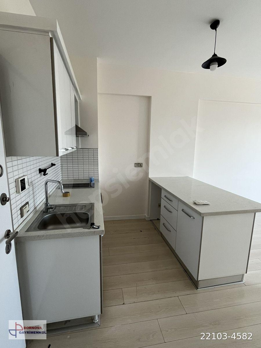 BORNOVA KAZIM DİRİKTE HAVUZLU SİTEDE 1+1 DAİRE
