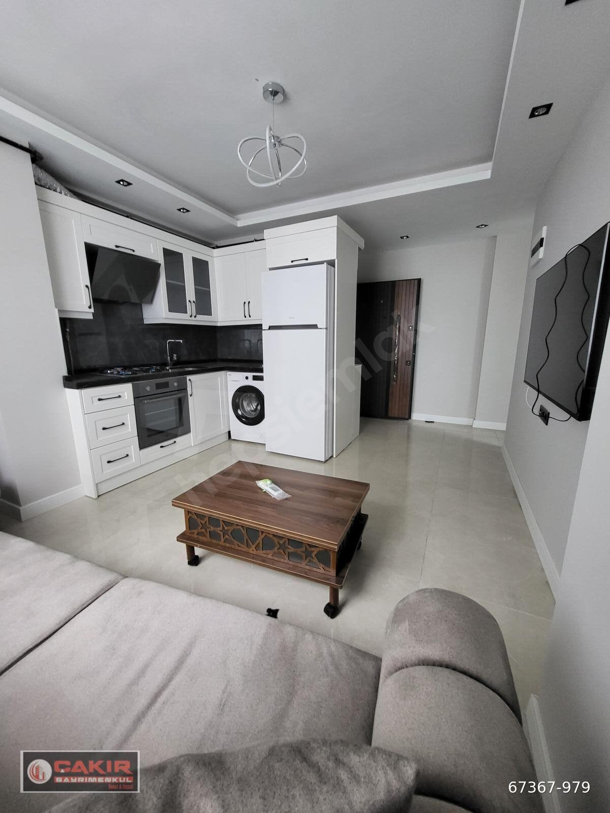 TRAMVAYA 2 DK EŞYALI KLİMALI DENİZ MANZARALI KİRALIK 1+1 DAİRE
