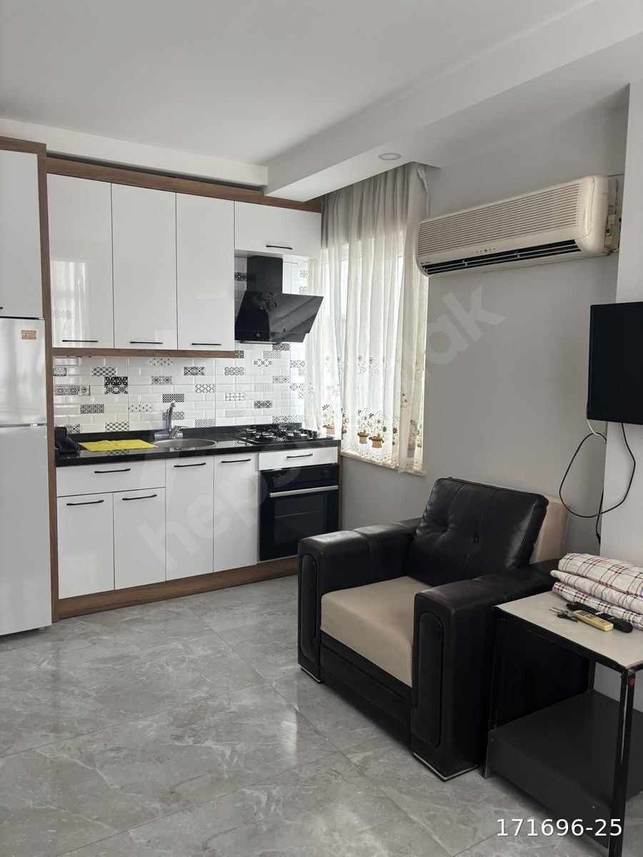 Merkezde 1+1 eşyalı kiralık daire