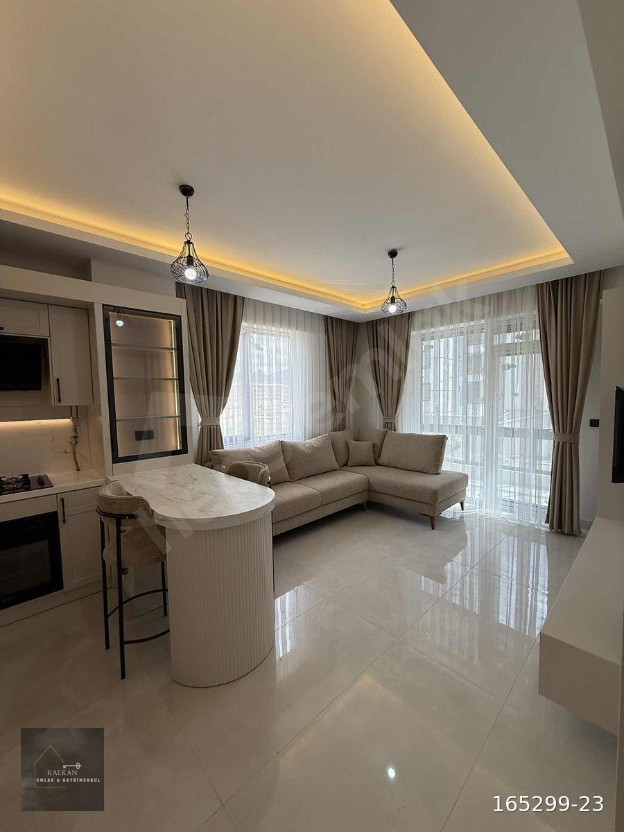 KALKAN'DAN UYDUKENTTE 2+1 ULTRA LÜX EŞYALI SATILIK DAİRE