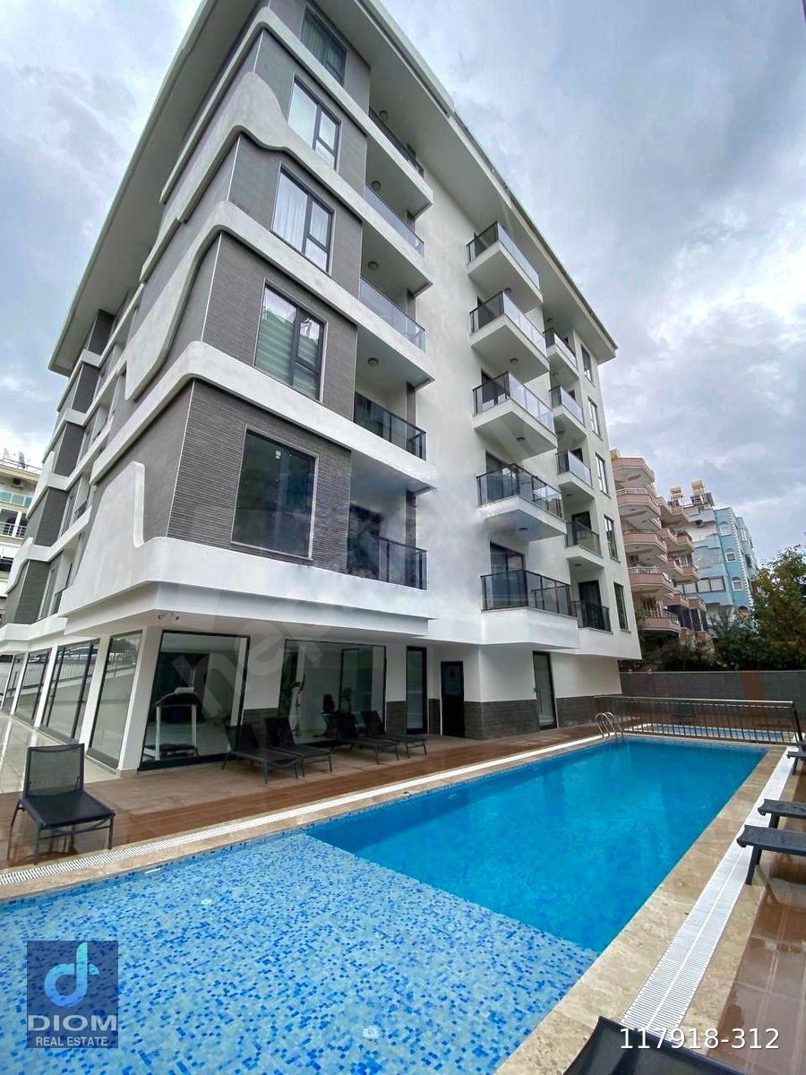 MERKEZDE DENİZE 200 M AYRI GİRİŞLİ 1+1+STÜDYO YÜKSEK KİRA GETİRİ