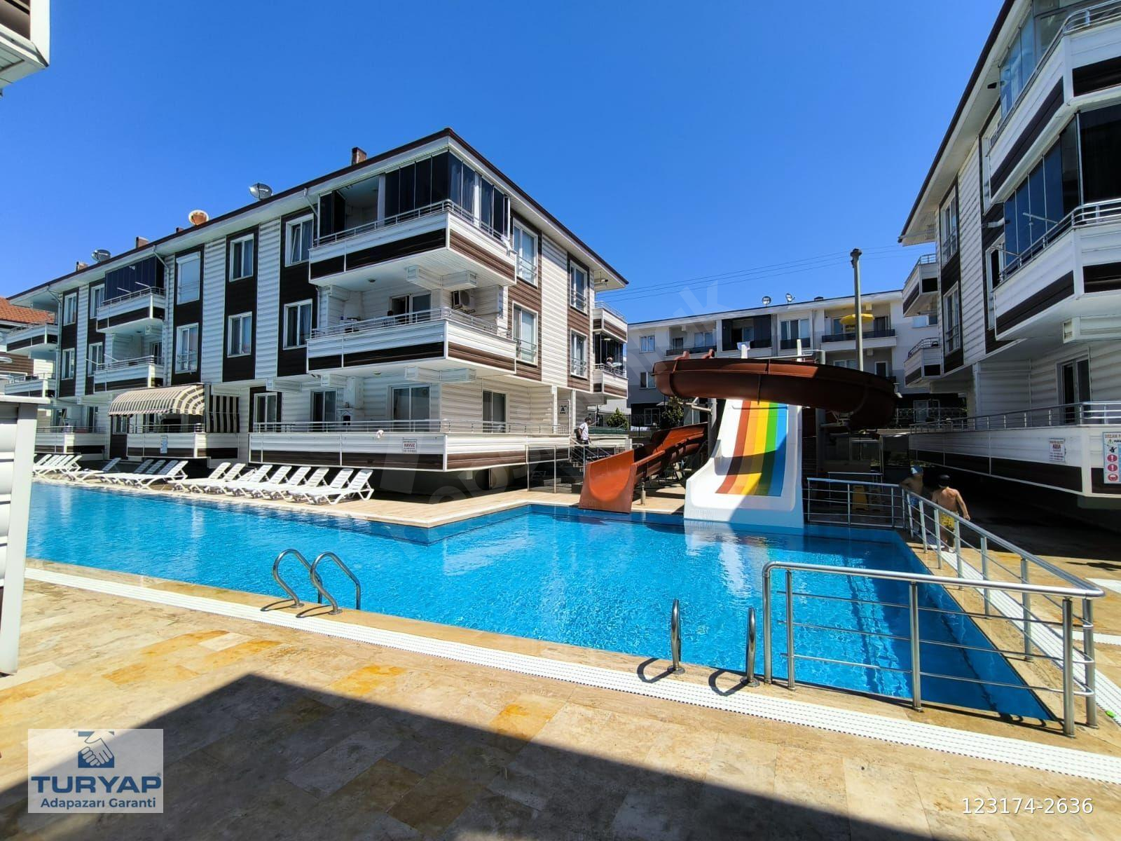 AQUA VE OLİMPİK HAVUZLU SİTEDE SATILIK 1+1 DAİRE