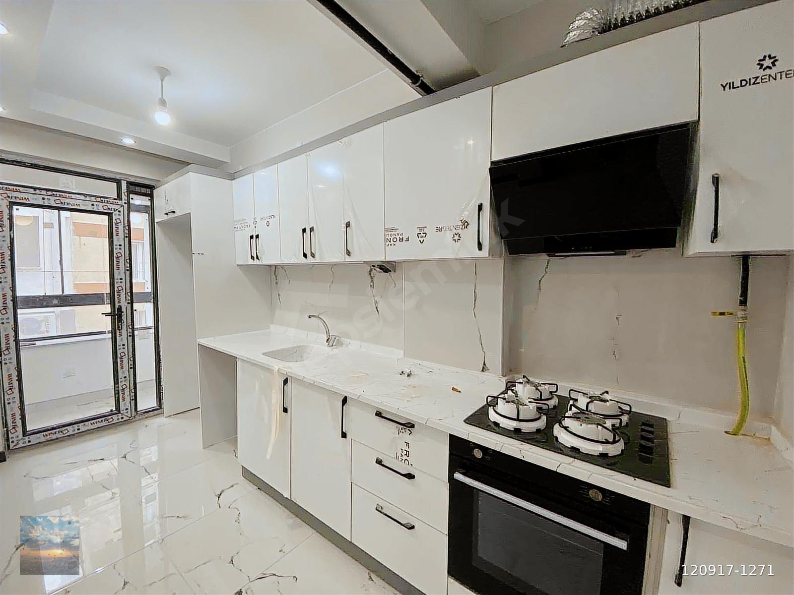 DEMİRHAN EMLAKTAN KAFKAS CADDESİ DİBİ KULLANIŞLI GENİŞ 2+0 DAİRE