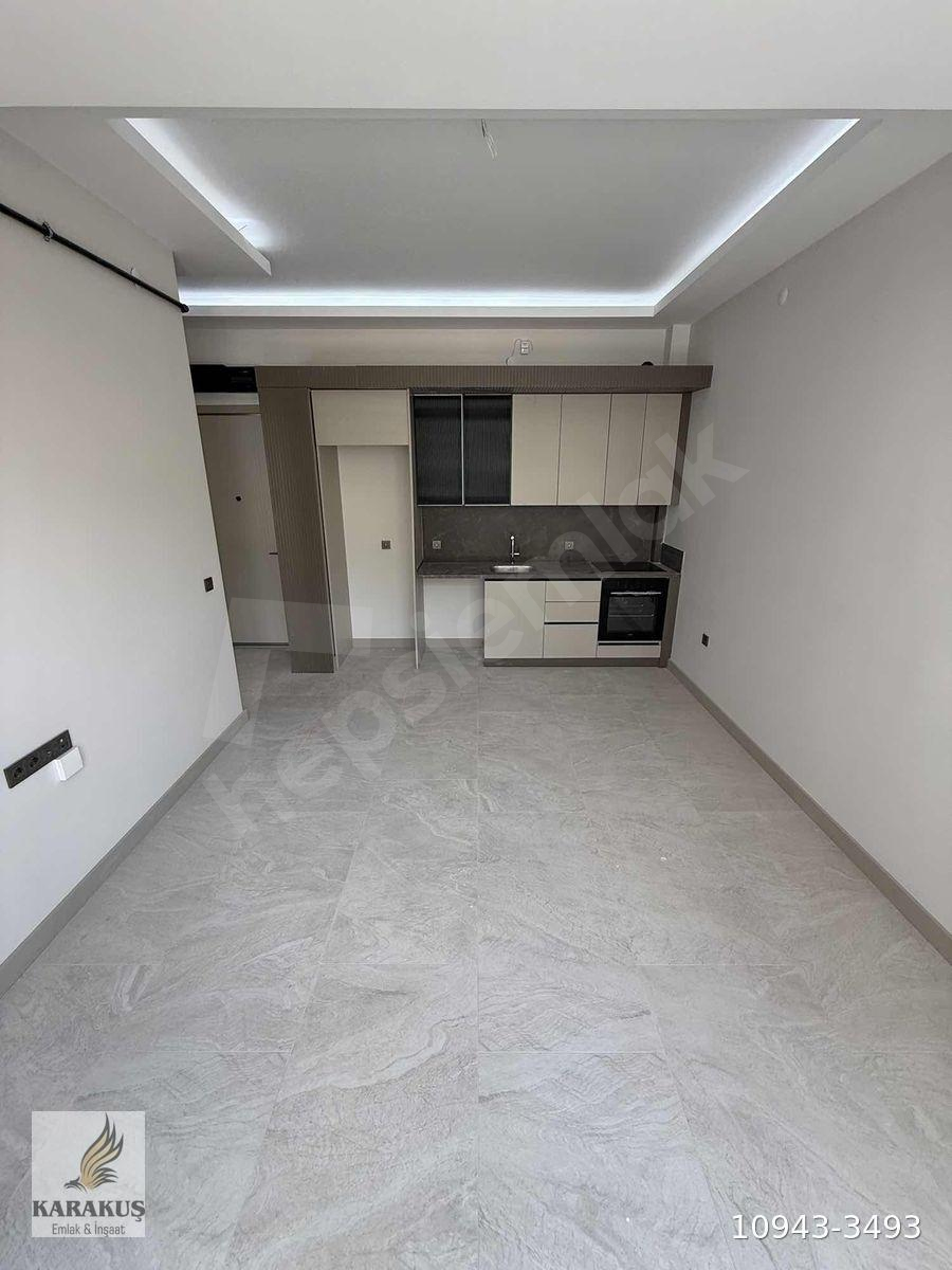 KARAKUŞ'TAN SÜPER LÜKS YAPILI,YERDEN ISITMA,KATTA,1+1 DAİRE