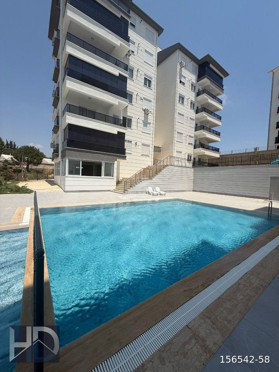 GEDİK MAHALLESİNDE HAVUZLU SİTE İÇERİSİNDE SATILIK 2+1 DAİRE