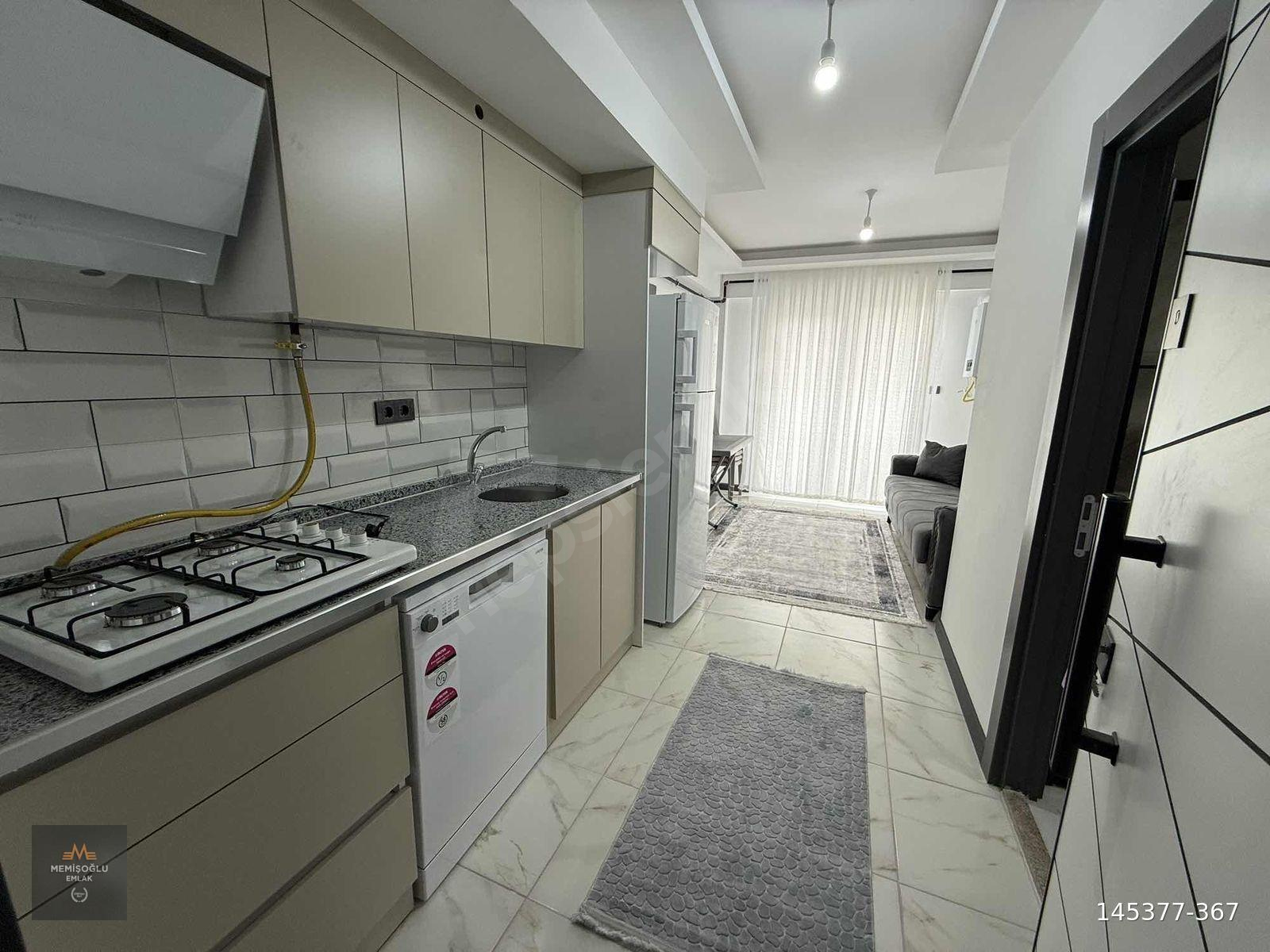 MEMİŞOĞLU EMLAK'TAN KİRALIK ÇARŞI İÇİNDE 1+1 EŞYALI SIFIR APART
