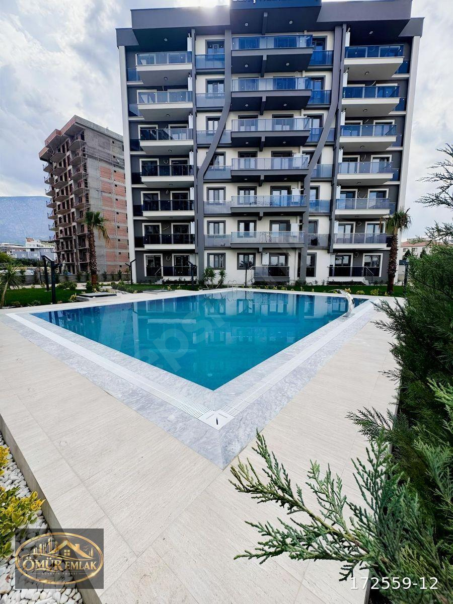 Kuşlubahçede havuz cepheli satılık 2+1 kombi ankastreli daire