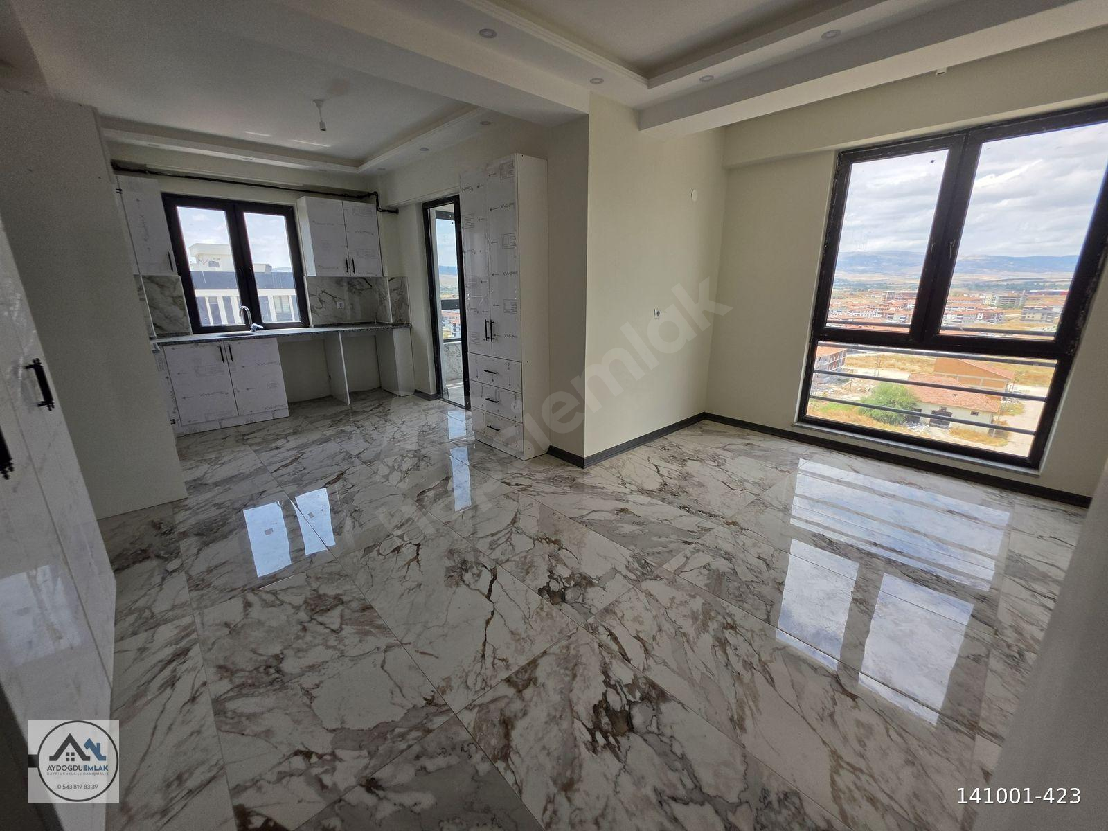 AYDOĞDU'dan kent park manzaralı 2+0 7.kat full yapılı daire.