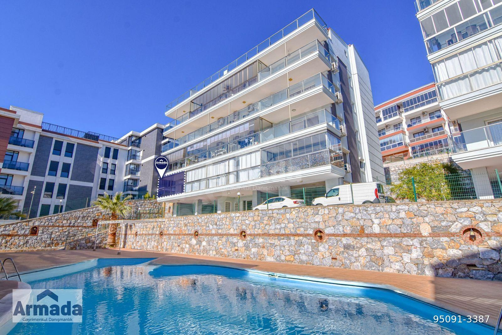 KUŞADASI DEĞİRMENDERE HAVUZLU SİTEDE DENİZ MANZARALI 2+1 DAİRE