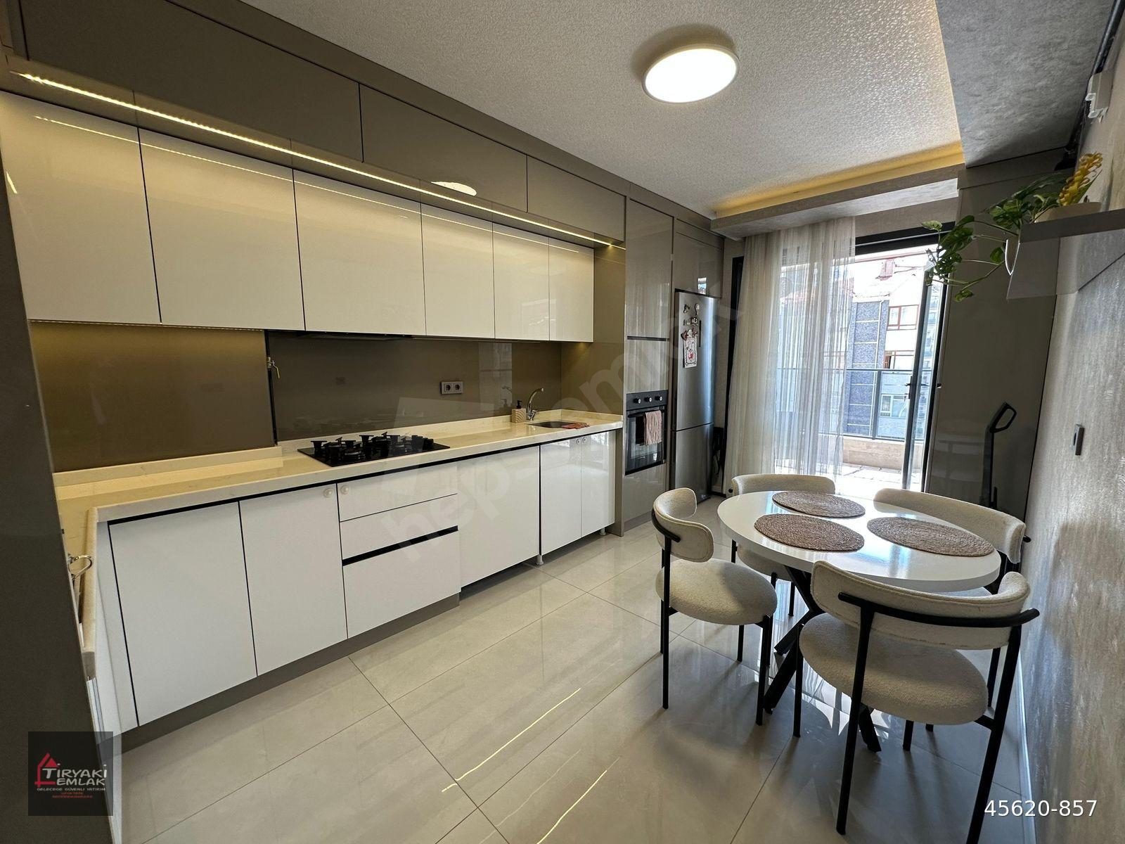 _TİRYAKİ'den_DUTLUK METROSU YANI_ORTA KAT_YENİ BİNA_TERAS BALKON