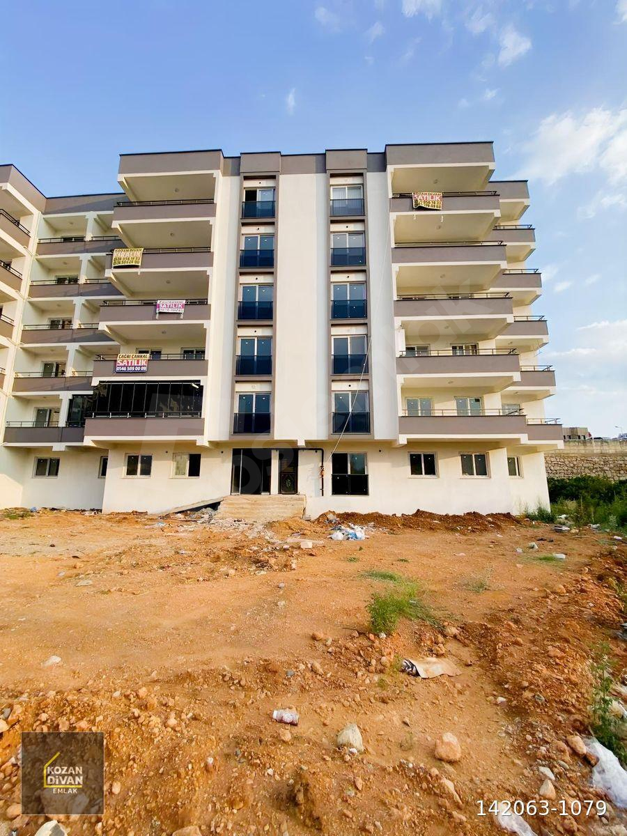 KOZAN DİVAN EMLAK'TAN IŞIKLI YOLA KOMŞU SIFIR DAİRE