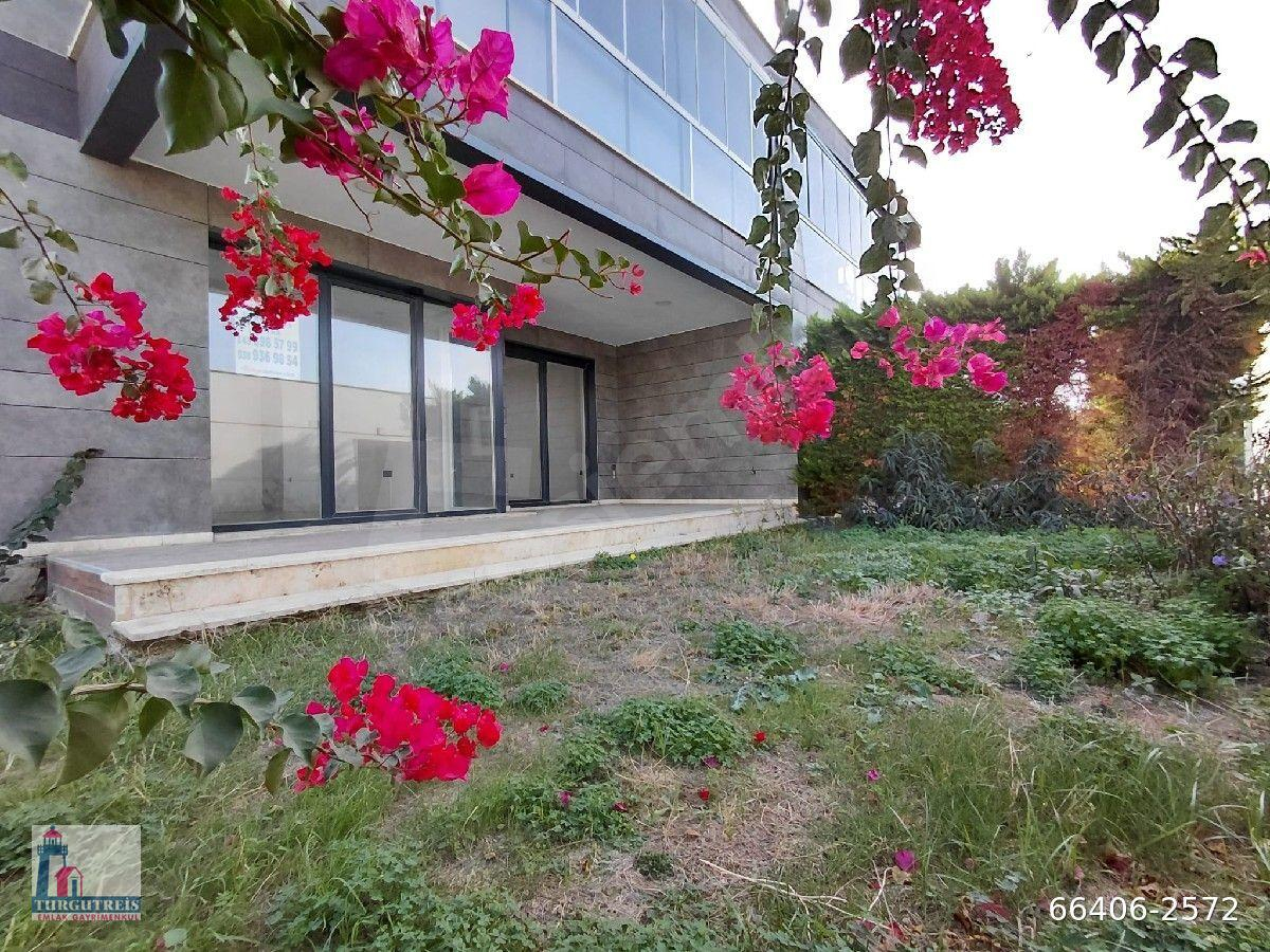 BODRUM TURGUTREİS'TE SATILIK 2+1 ÇİFT BANYOLU'HAVUZLU' BAHÇELİ DAİRE