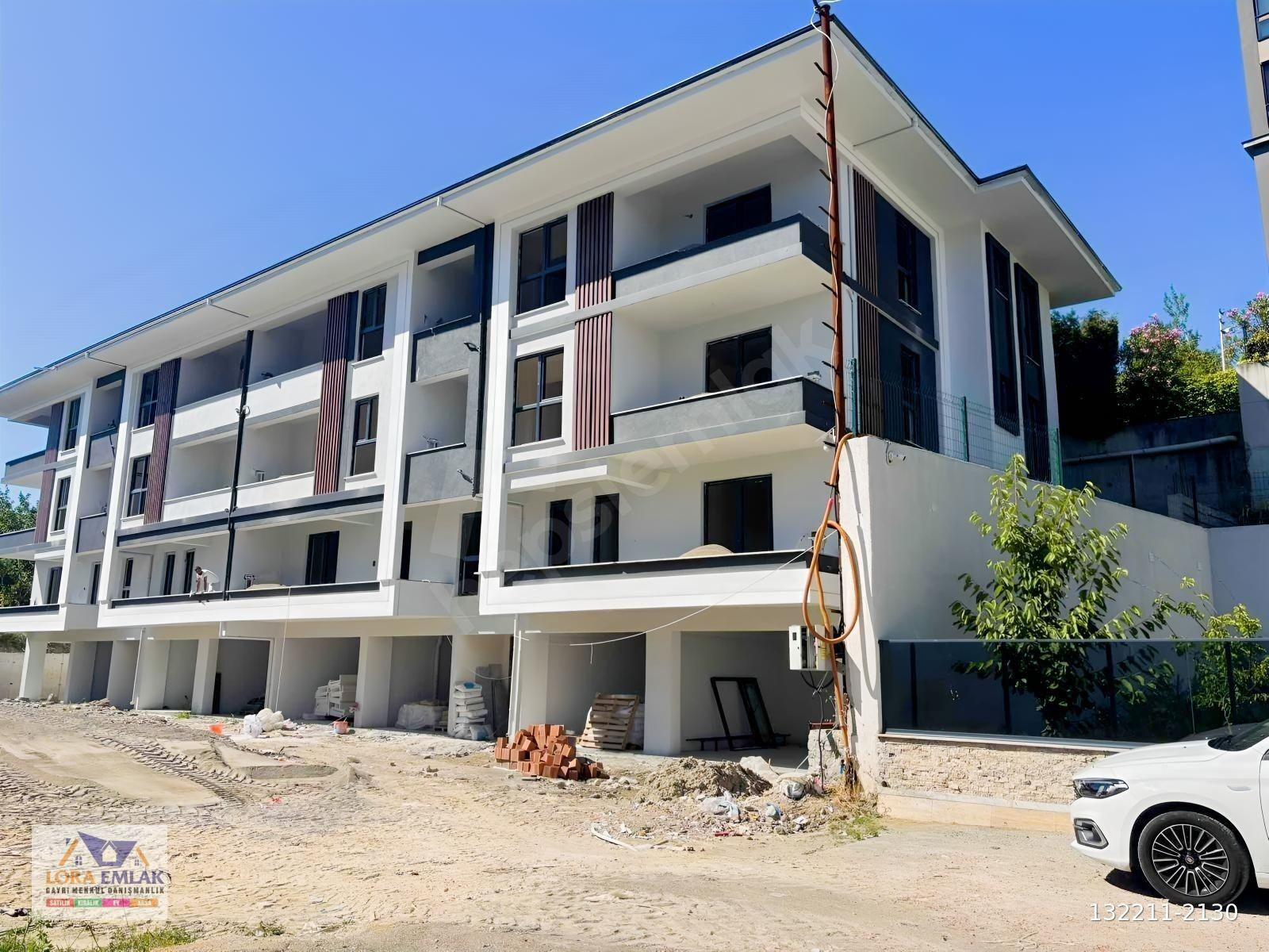 ÇAVDARLI SUPARK MEVKİNDE DENİZ MANZARALI AYRI MUTFAK SATILIK 1+1