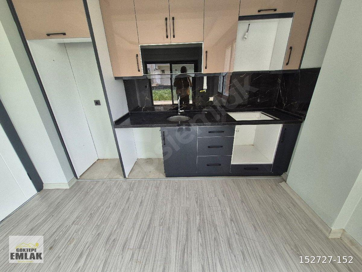 GÖKTEPE EMLAK BAHÇELİEVLERDE SIFIR BİNADA BAHÇE KULLANIMLI FULL 1+1