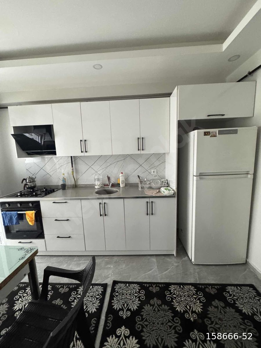 Diyarbakır caddesinde sıfır aile binası 1+1