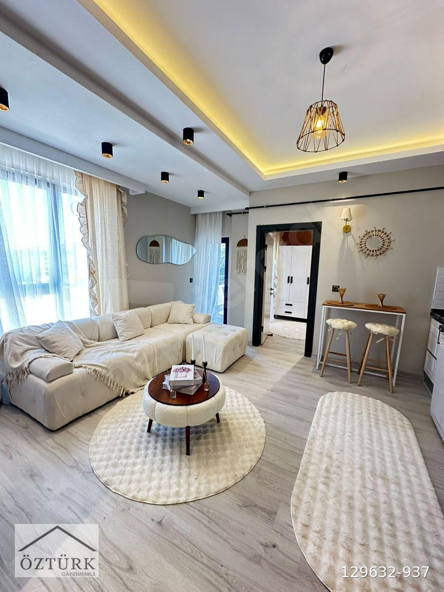 ATAKUMUN GÖZDE BÖLGESİ KÖRFEZDE HAVUZLU SİTEDE FULL EŞYALI 2+1
