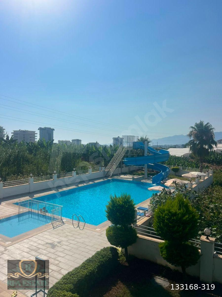 Mahmutlarda 1+1 Eşyalı Full Aktiviteli Sitede Satılık Ara Kat Daire 60.000 Euro