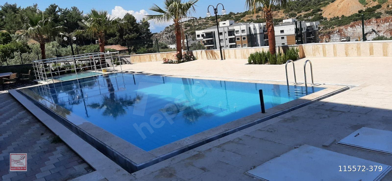 KUŞADASI BAHÇE KATI HAVUZ MANZARALI 1+1ACİL SATILIK FIRSAT DAİRE