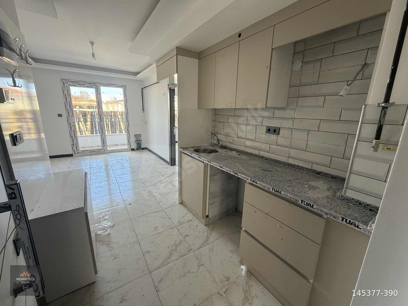 MEMİŞOĞLU EMLAK'TAN KİRALIK ÇARŞIDA 2.KAT 1+1 SIFIR APART
