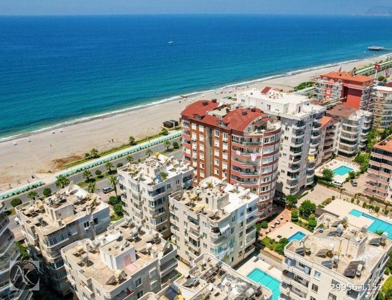 ALANYA MAHMUTLARDA SATILIK DENİZE SIFIR SİTEDE 3+1 YAZLIK KENDİ PLAJ YOLU GENİŞ HAVUZLU