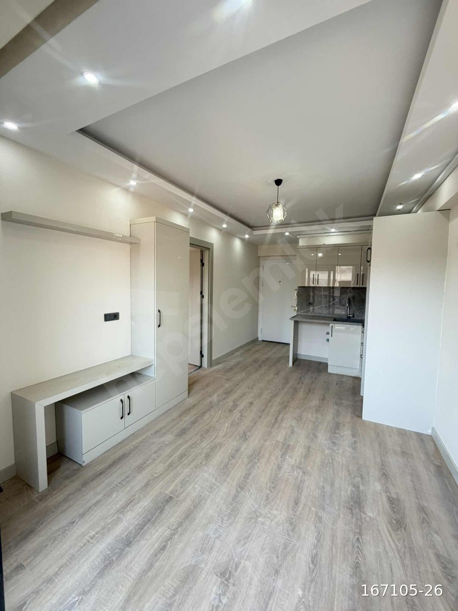 İSTASYON MAHALLESİNDE SATILIK 1+1 BÜYÜK BALKONLU DAİRE