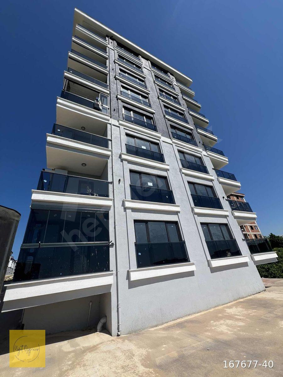 YİĞİT ÖZGÜNER EMLAK KARŞIYAKA-TERZİLİ FULL MANZARALI 2+1 DAİRE