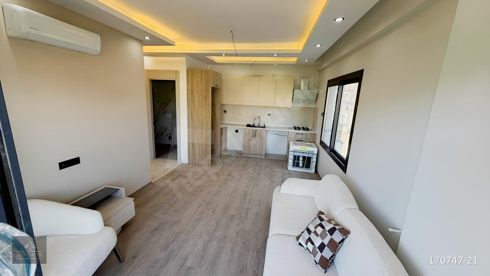 ERDEMLİ 1+1 JENARATÖRLÜ MERKEZİ KONUM DAİRE 1250 KREDİ İMKANI