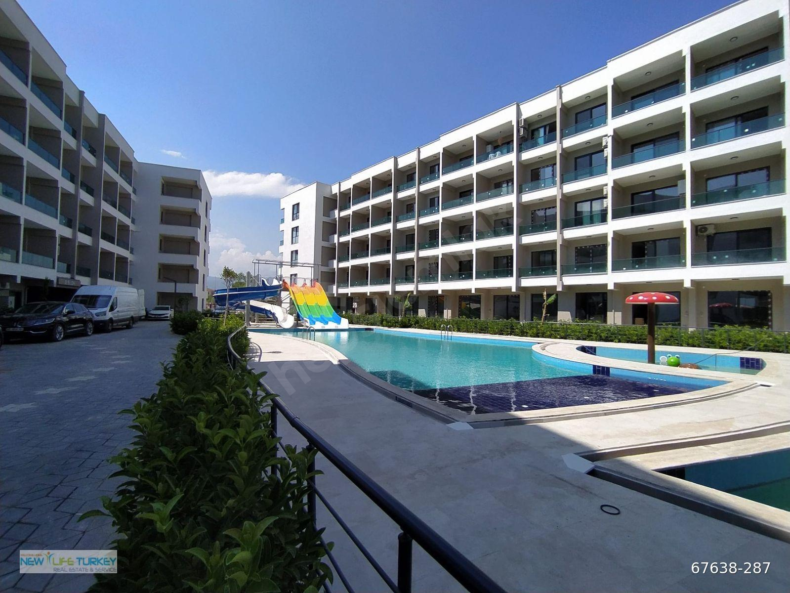 TÖMÜK'TE DENİZE YAKIN 1+1 LÜX YATAY MİMARİ