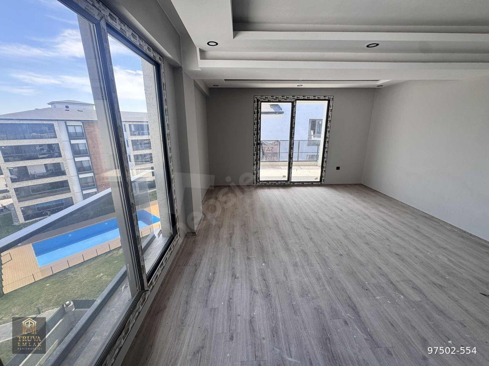 TRUVA'DAN SİTE İÇİNDE FERAH KULLANIŞLI SIFIR 3+1 SATILIK DAİRE