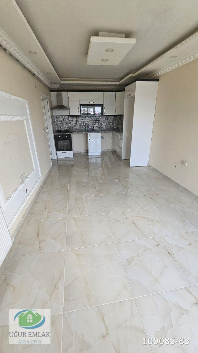 Büyükyoncalı'da merkezi konumda,cadde üzeri,kiralık 1+1 daire.