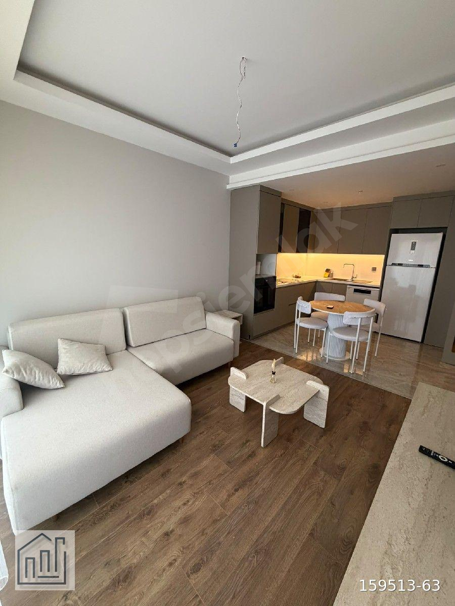 Antalya Döşemealtı Suncity 1 de eşyalı katta havuzlu 1+1 dairemiz kiralıktır.