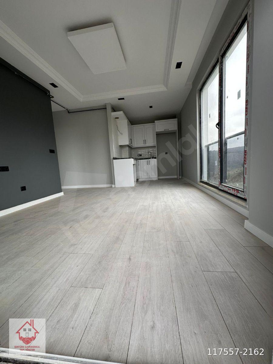 Şentürk gayrimenkulden pamuklu bulvarında kiralık boş 1+1 daire