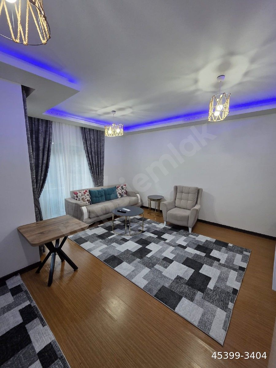 konyaaltı limanda havuzlu kapalı otaparklı 1+1 eşyalı kiralık daire