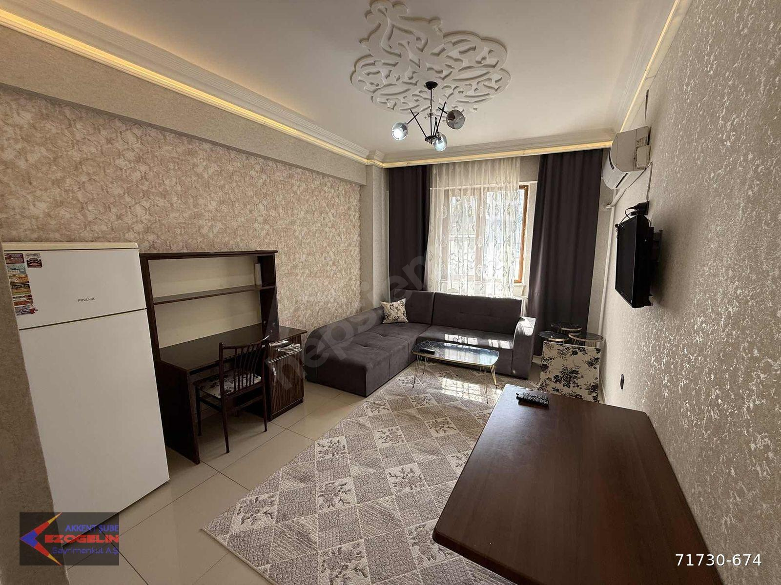 EZOGELİN'DEN MERKEZİ KONUMDA GENİŞ BAKIMLI İSKANLI 1+1 DAİRE...